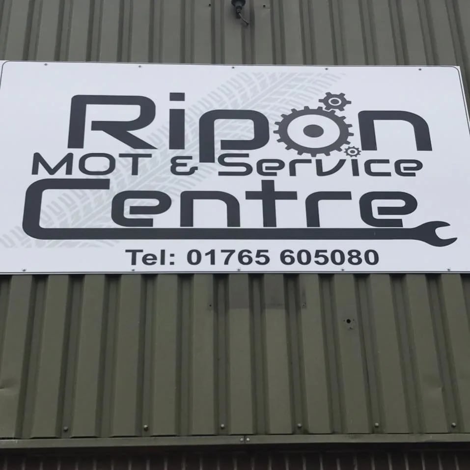Our sign: Ripon MOT & Service Centre, Tel 01765 605080